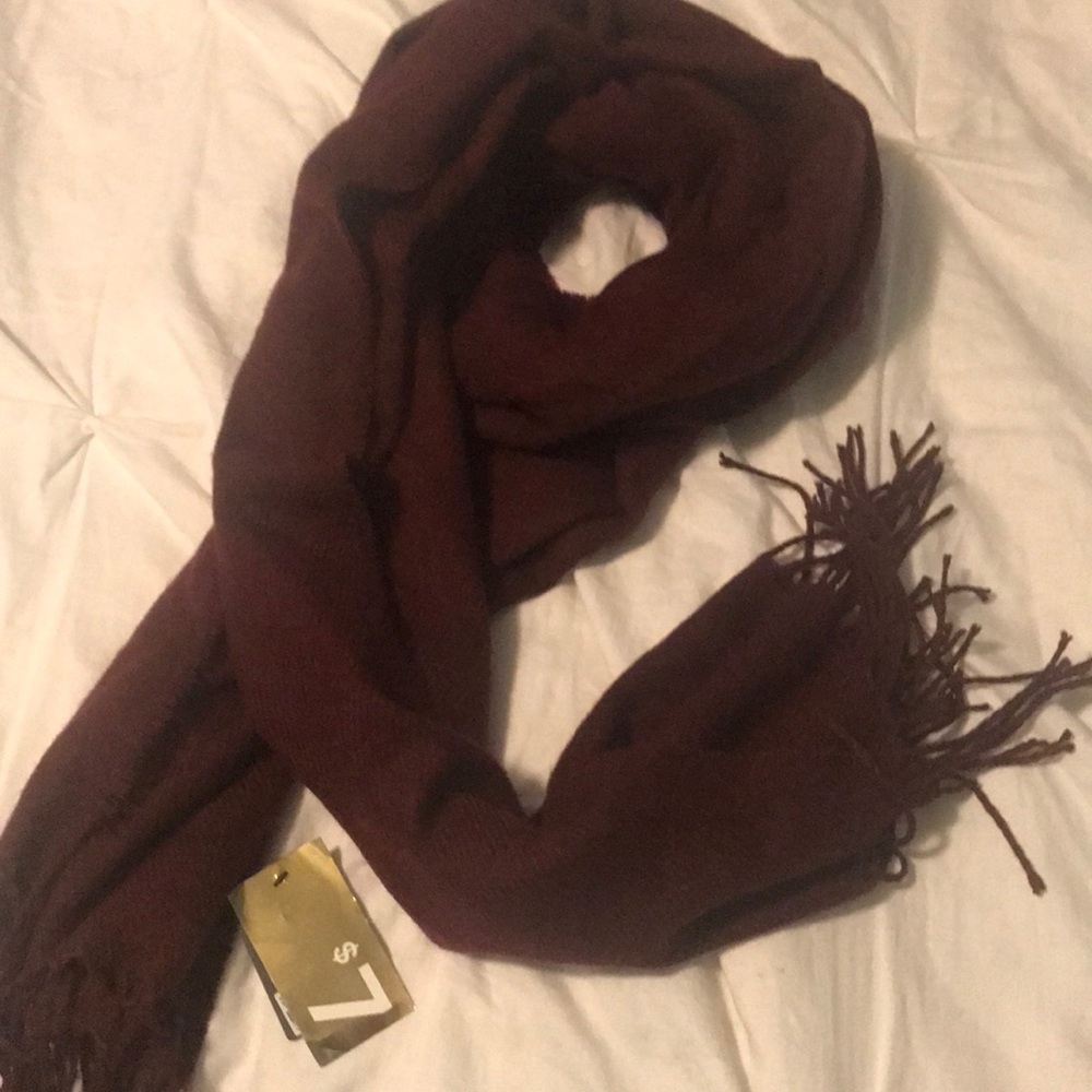 Soft and cozy maroon scarf. New with tags